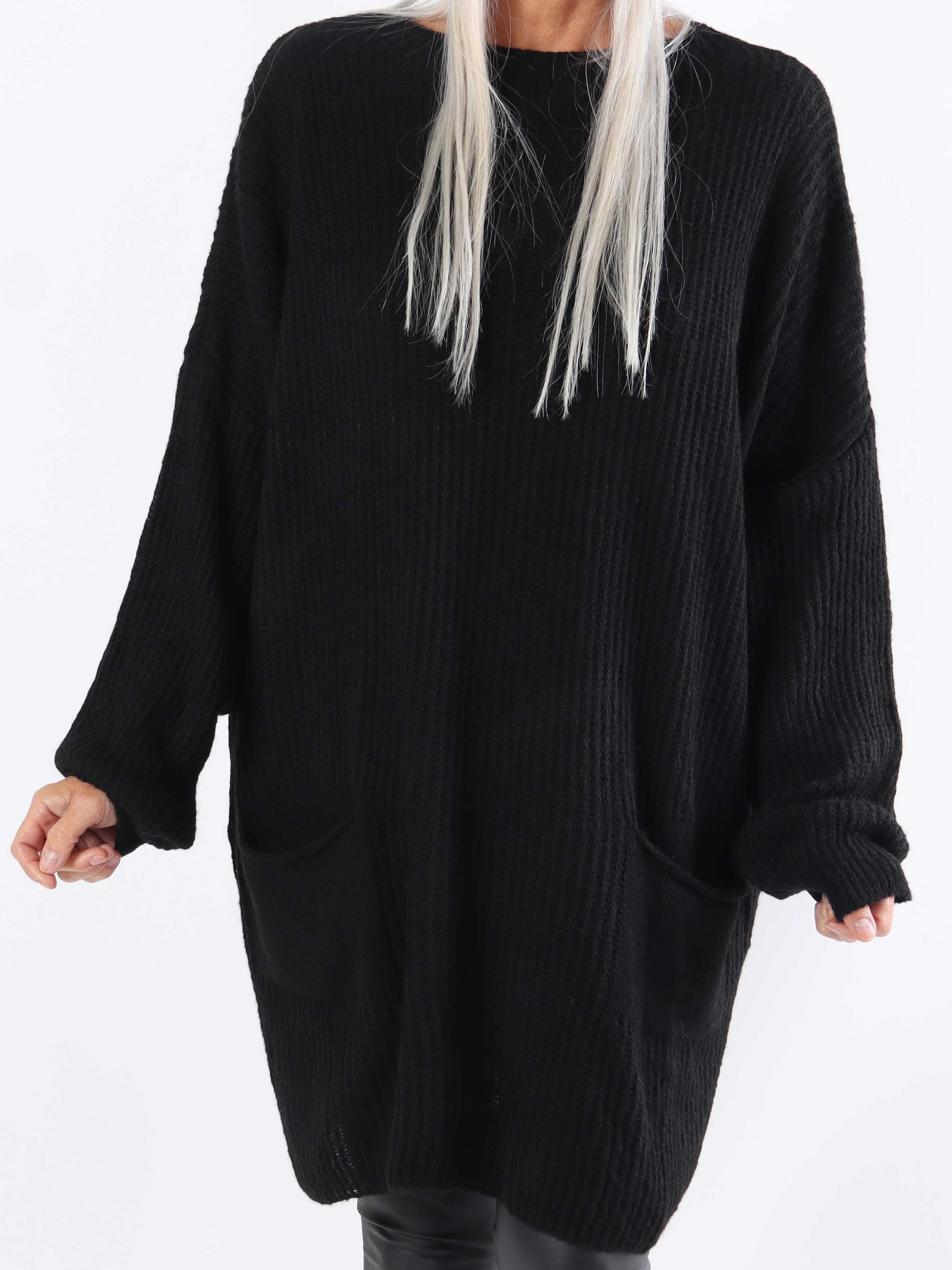 Dakota - Lång stickad blus i plus size med fickor